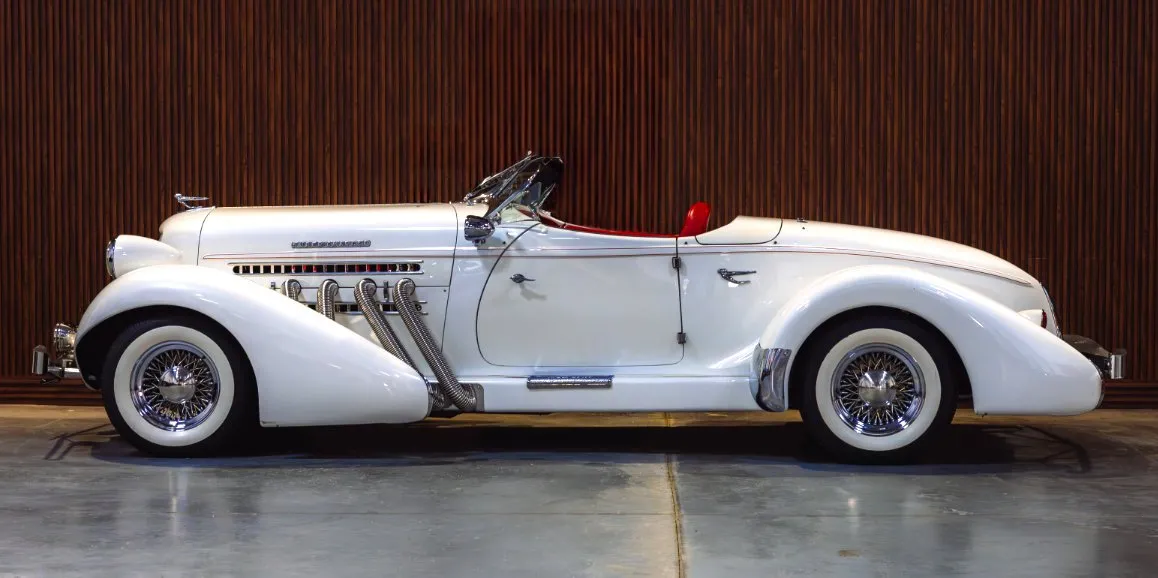 Auburn Speedster 1936 (VINTAGE) finished in white, outer view; convertible roof visible Auburn Speedster 1936 (VINTAGE) finished in white, outer view; convertible roof visible