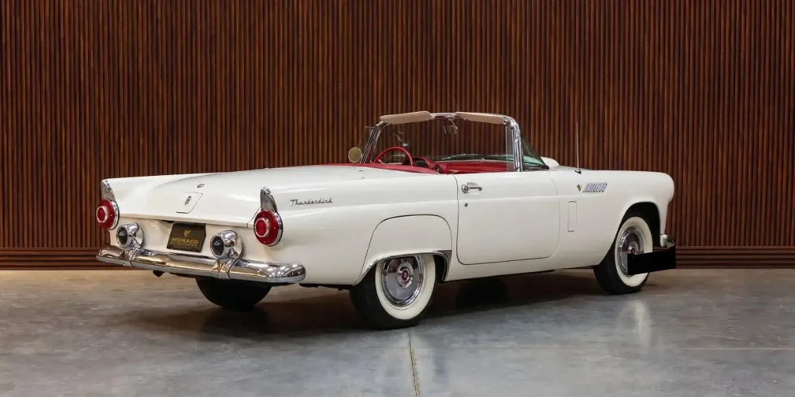 Ford Thunderbird finished in white, outer view; convertible roof visible Ford Thunderbird finished in white, outer view; convertible roof visible
