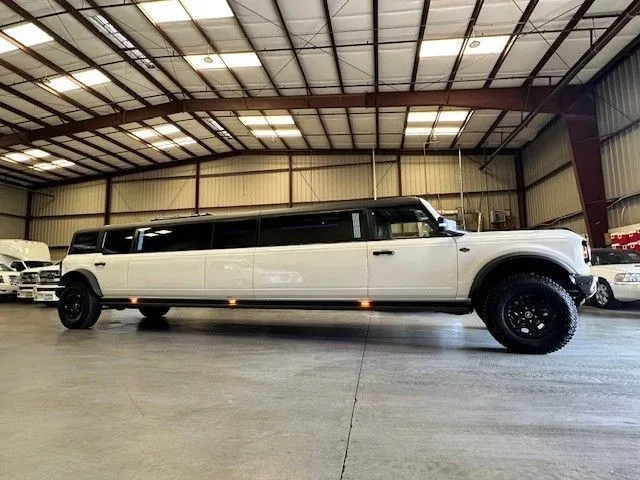 13 Passenger Bronco Limousine with Jet Door for wedding car rental