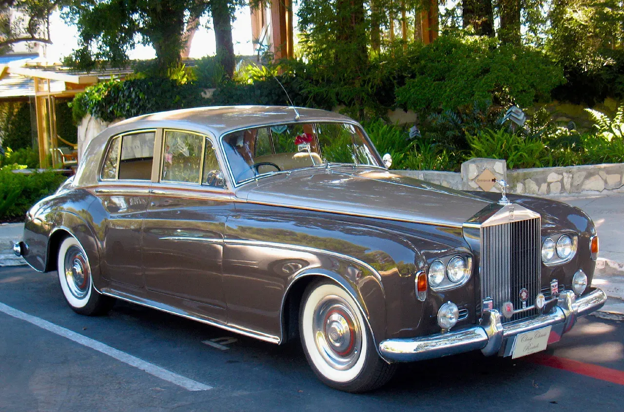 Gray 1963 Rolls Royce Silver Cloud III for wedding car rental in Round Mountain, CA