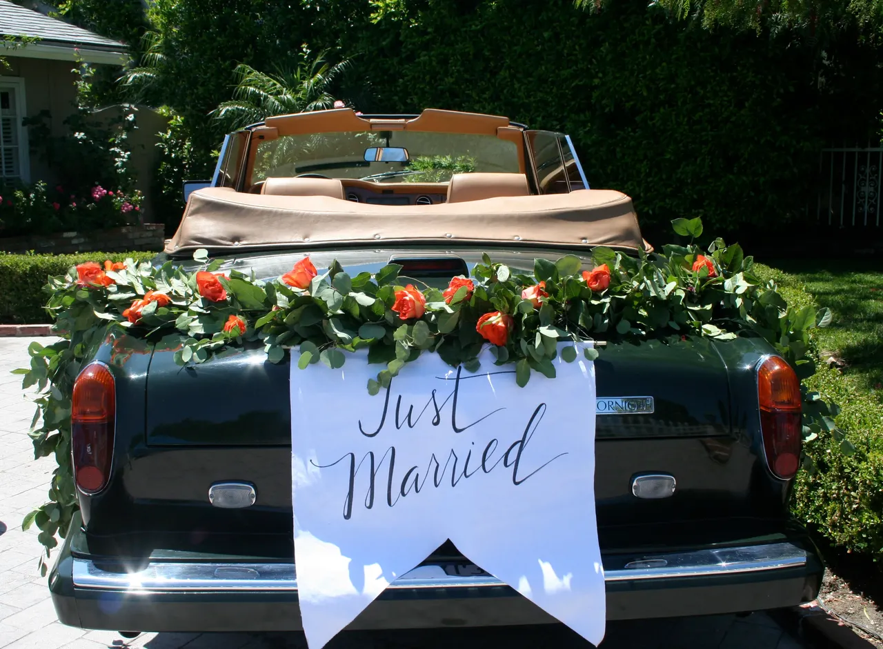 Green 1983 Rolls-Royce Corniche Convertible exterior with convertible roof, photo 7 for wedding car rental in Northridge, CA