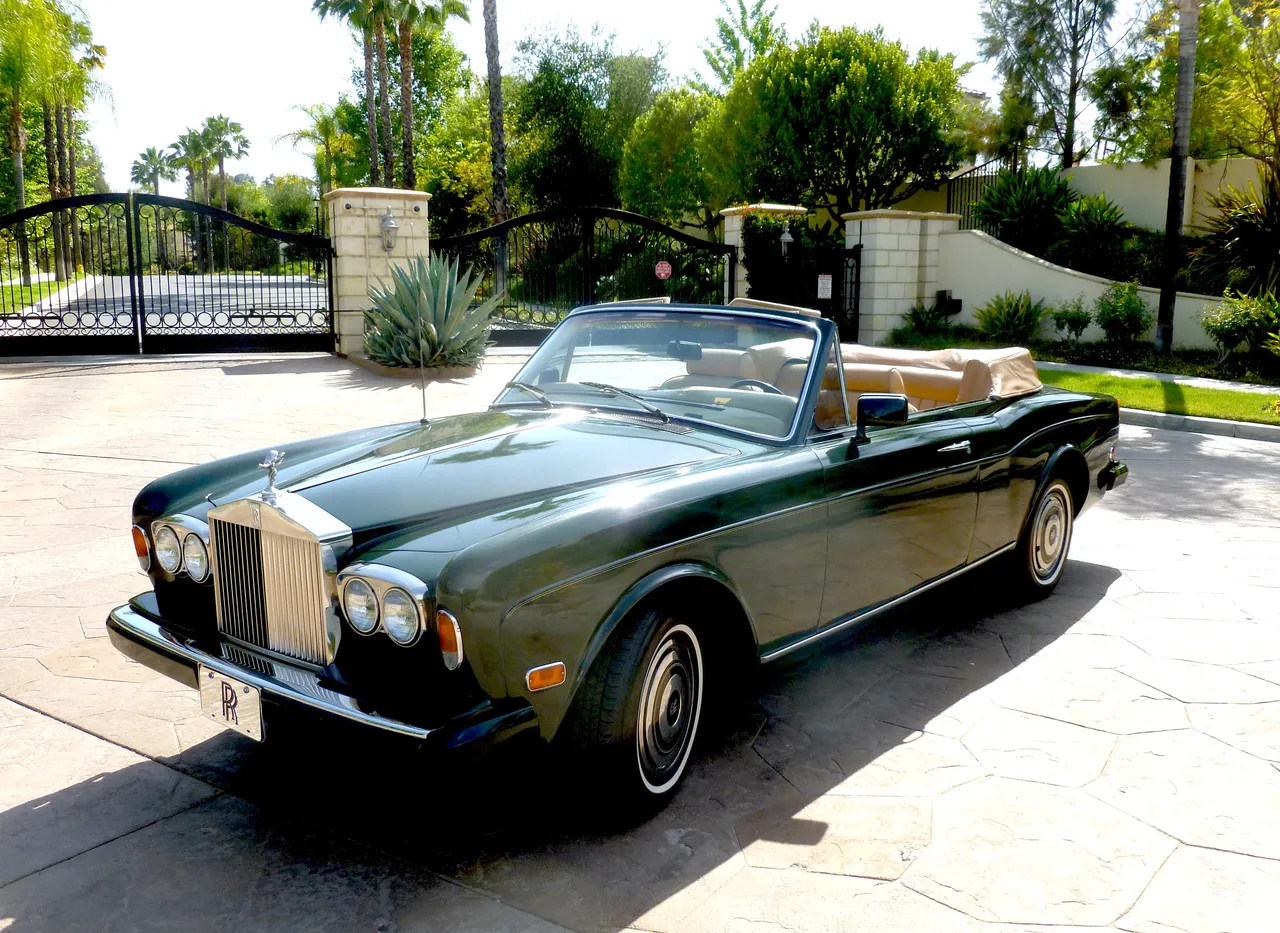 Green 1983 Rolls Royce Corniche Convertible for wedding car rental in California