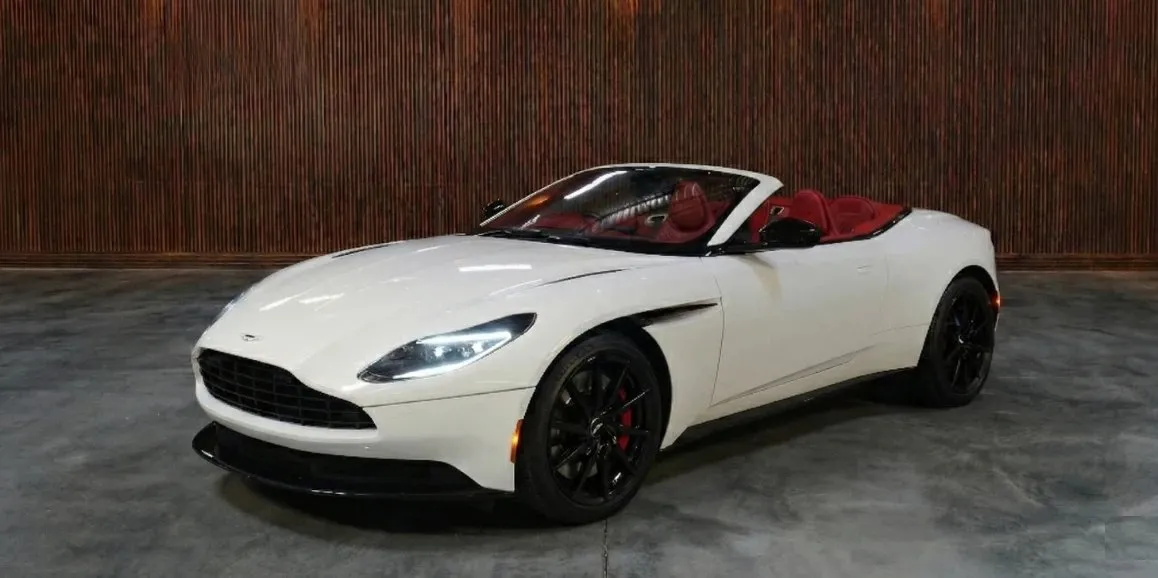 White Aston Martin DB11 exterior with convertible roof for wedding car rental in Toms River, NJ