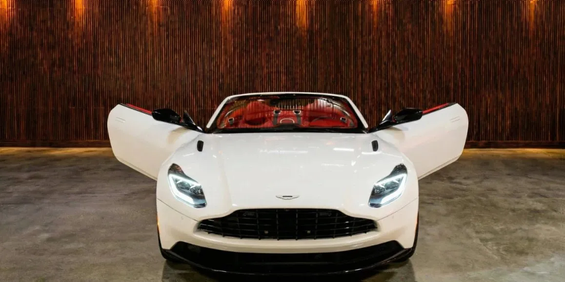 White Aston Martin DB11 with convertible roof for wedding car rental in Toms River, NJ