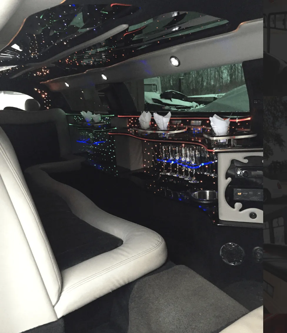 C300 Limousine interior with LED accent lighting, starlight or fiber-optic ceiling and bar area for wedding car rental