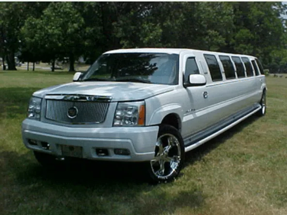 White Cadillac Escalade Limousine Cadillac Escalade Limousine finished in white; tinted windows and running boards visible