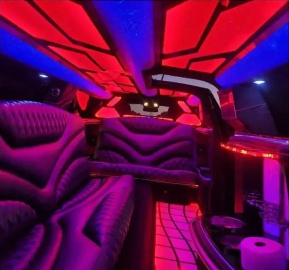 Charger Limousine interior with LED accent lighting, LED ceiling lighting and lit dance floor for wedding car rental