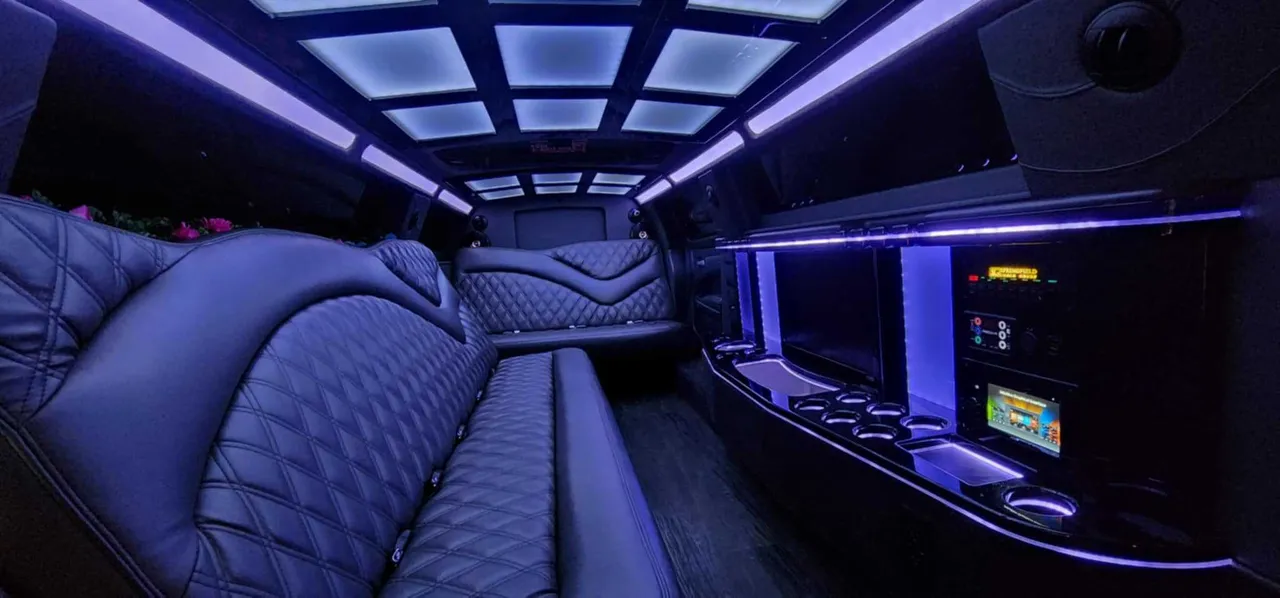 2020 Chrysler 300 Limousine (White Lightning) 2020 Chrysler 300 Limousine (White Lightning) interior with perimeter lounge seating, LED accent lighting and LED ceiling lighting for wedding car rental