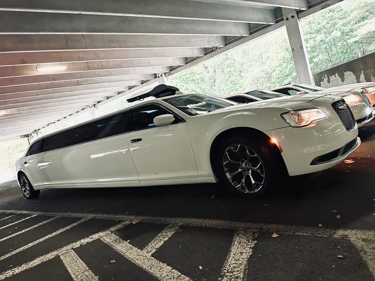 White Chrysler 300 for wedding car rental