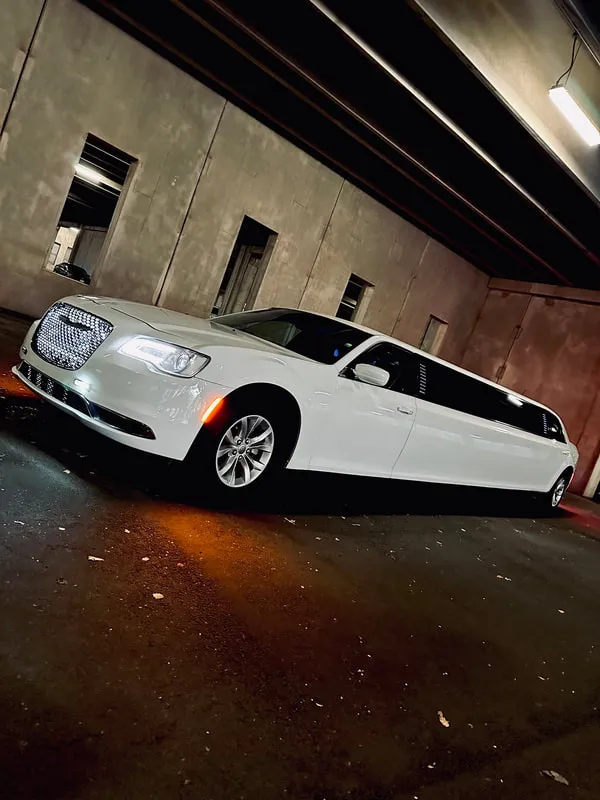 White Chrysler 300 Jet Doors exterior for wedding car rental