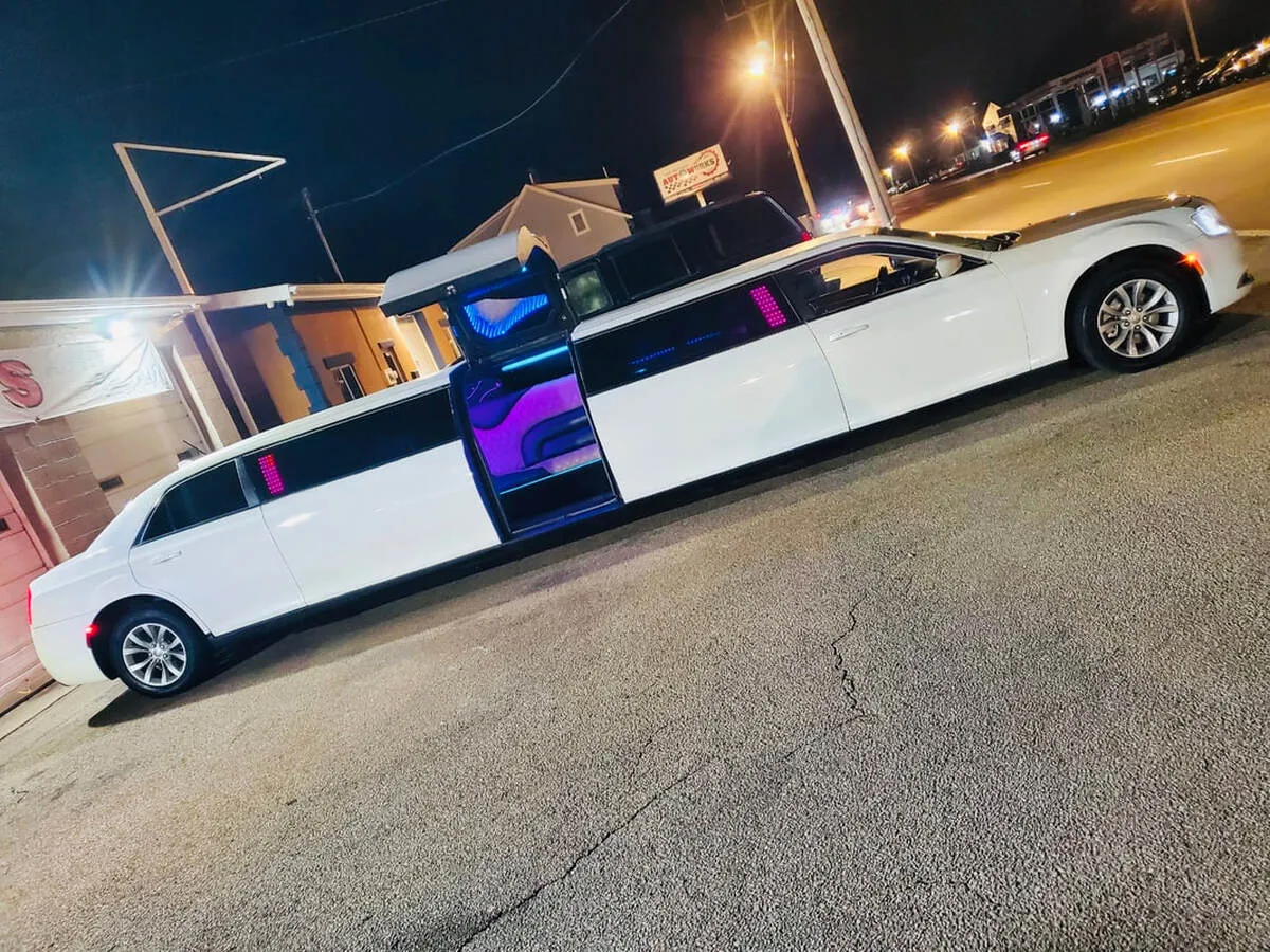 White Chrysler 300 Jet Doors exterior with bridal (jet) door for wedding car rental
