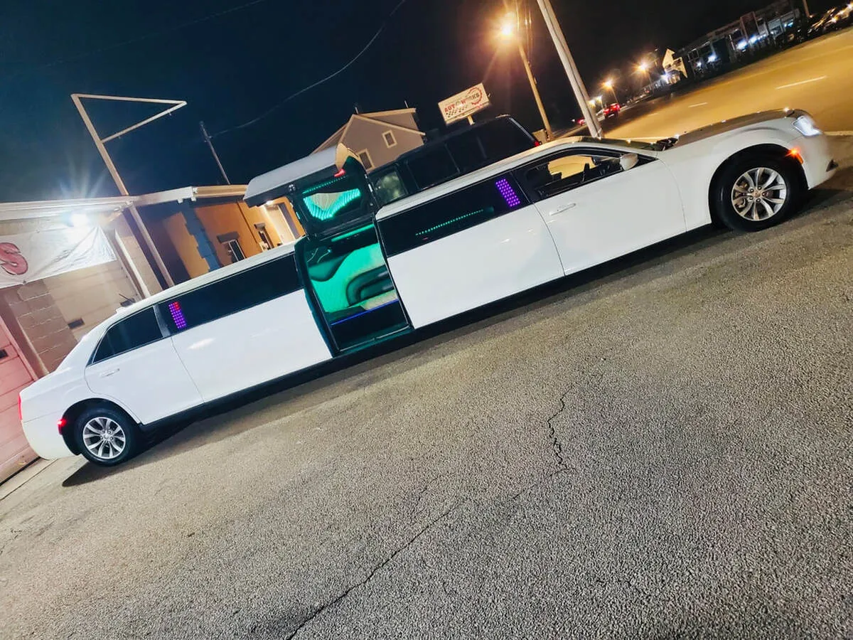 White Chrysler 300 Jet Doors exterior with bridal (jet) door, photo 3 for wedding car rental