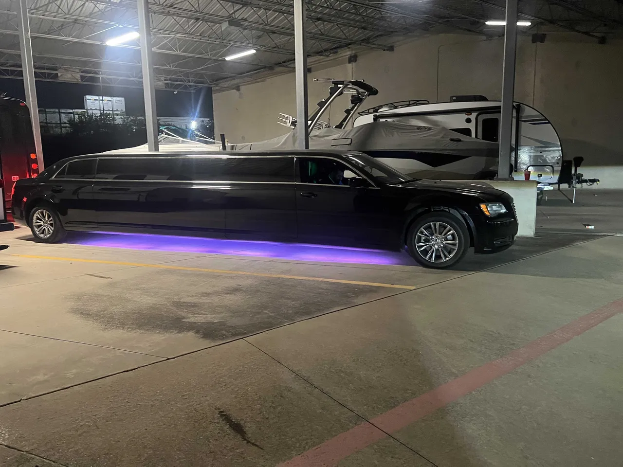 Chrysler Limousine Black Chrysler Limousine with tinted windows for wedding car rental