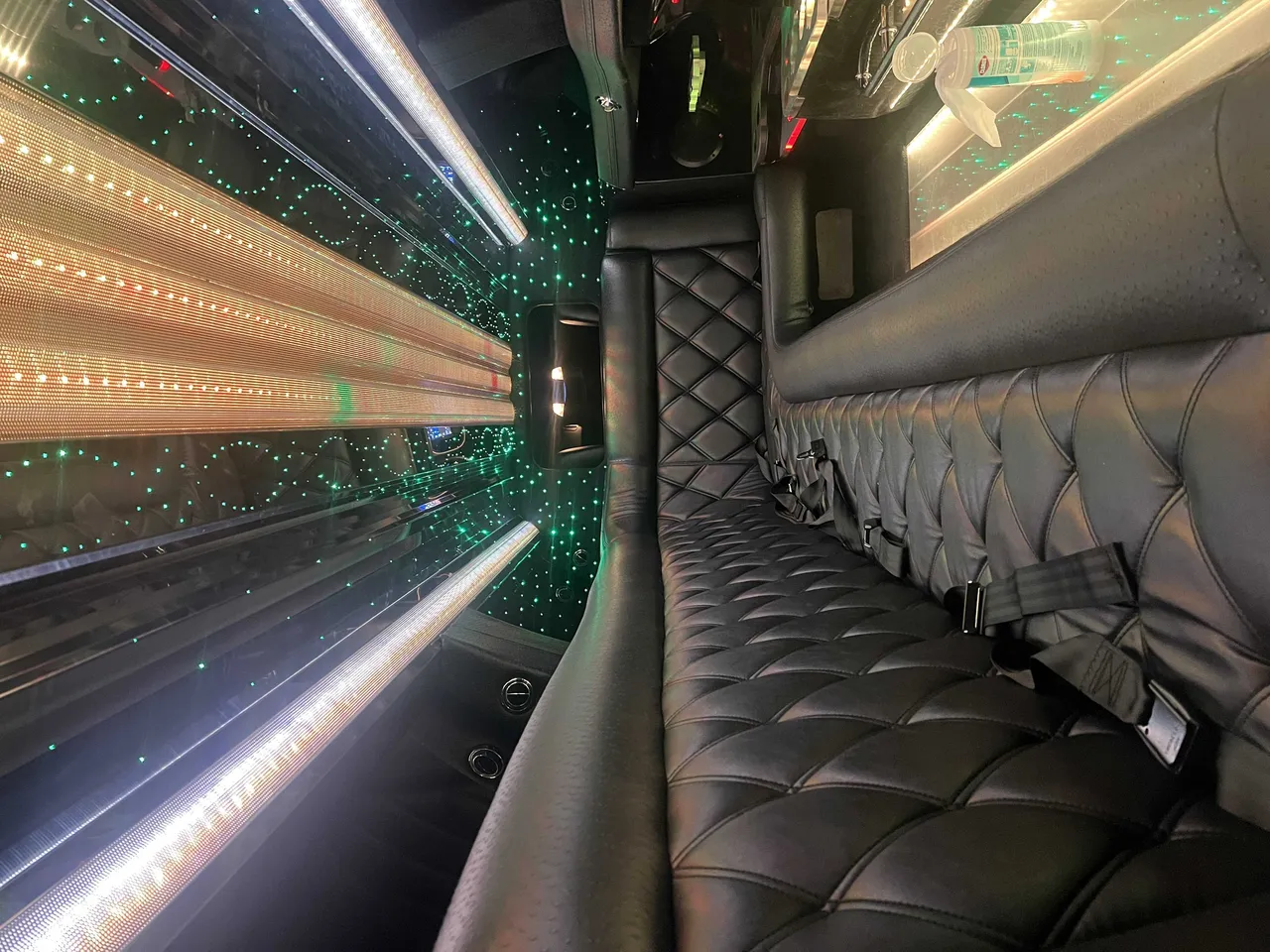 Chrysler Limousine interior with LED ceiling lighting and starlight or fiber-optic ceiling for wedding car rental