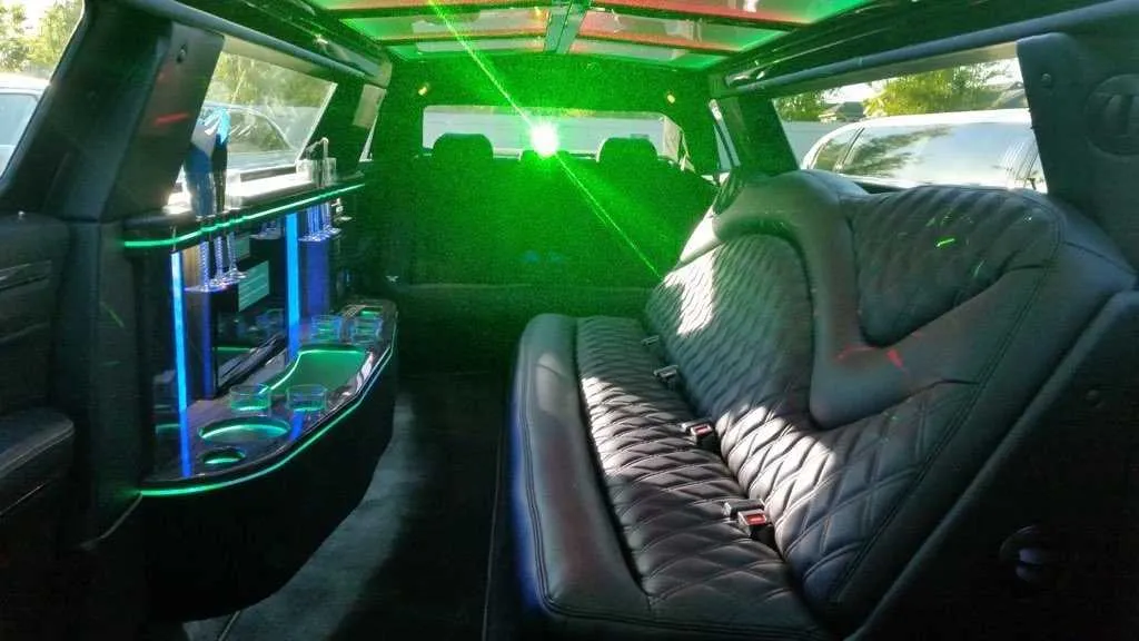 Chrysler Stretch Limousine Chrysler Stretch Limousine interior with LED accent lighting and bar area for wedding car rental