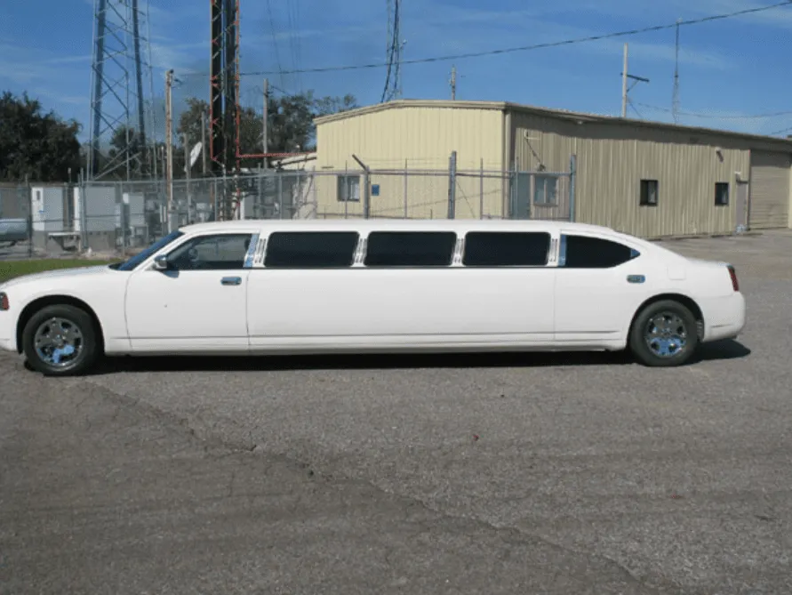 White Dodge Charger exterior with tinted windows for wedding car rental