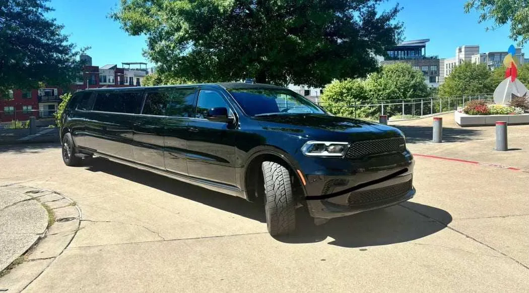 Dodge Durango Stretch Limousine Black Dodge Durango Stretch Limousine with tinted windows for wedding car rental
