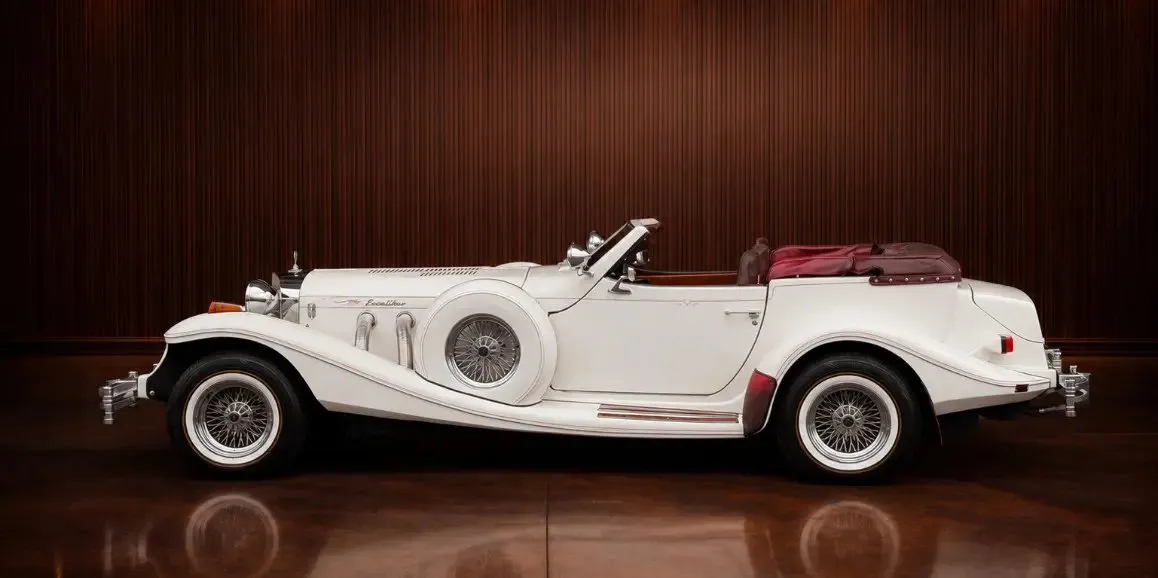 White Excalibur Phaeton (Vintage) exterior with convertible roof for wedding car rental in Toms River, NJ