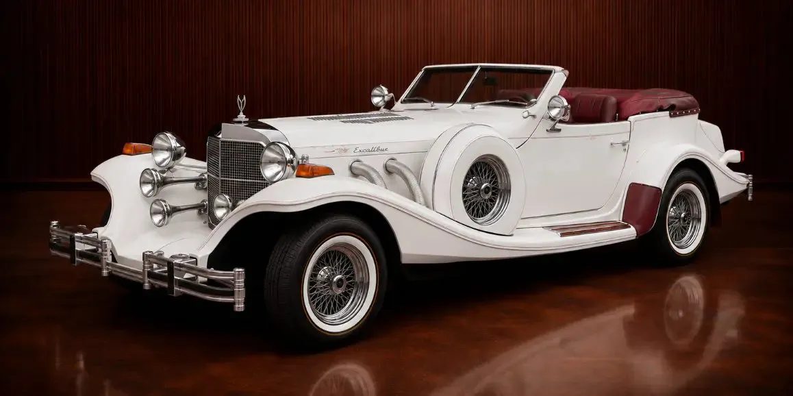 White Excalibur Phaeton (Vintage) with convertible roof for wedding car rental in Toms River, NJ