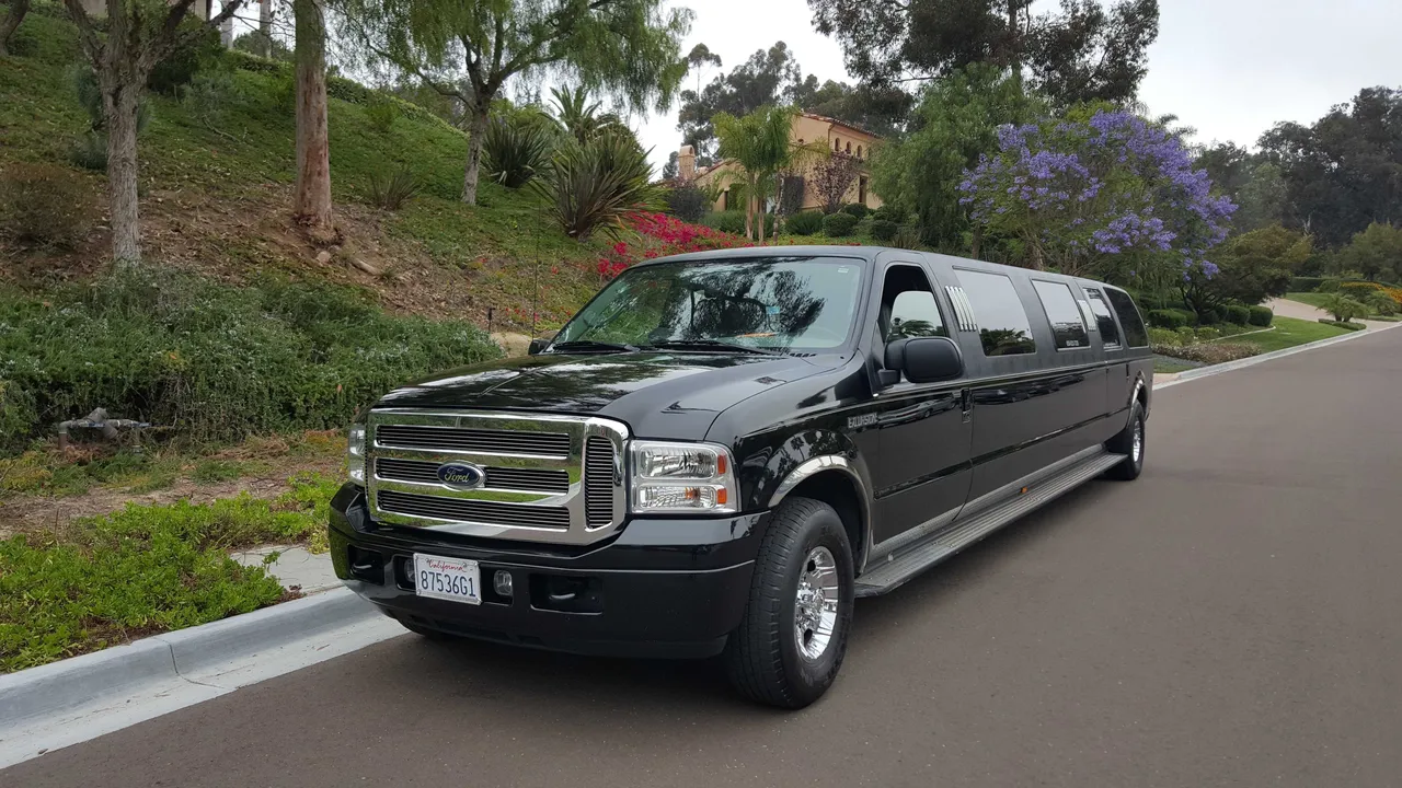 Excursion Limousine Black Excursion Limousine with tinted windows for wedding car rental