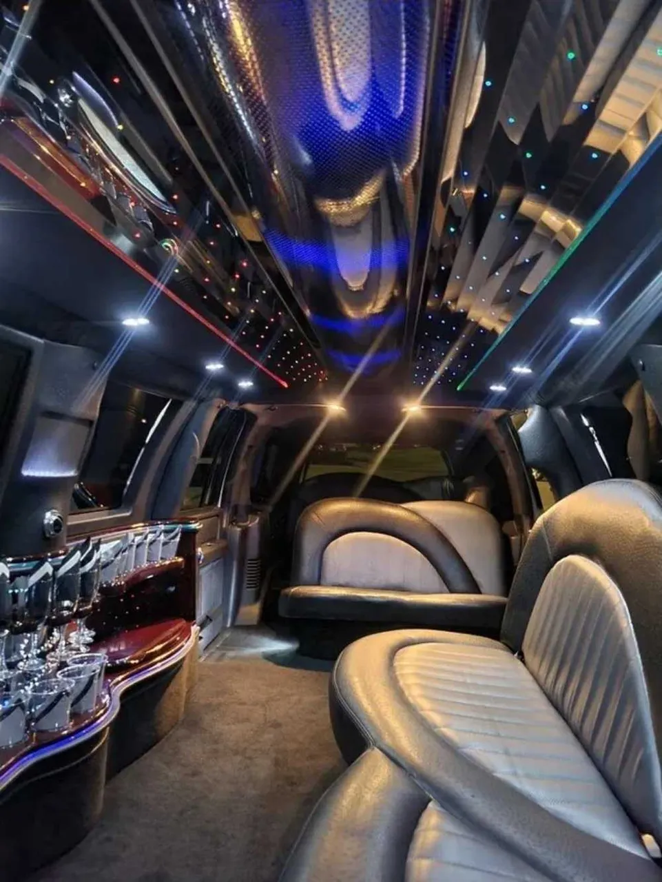 Ford Expedition Limousine interior with LED accent lighting, starlight or fiber-optic ceiling and mirrored ceiling, photo 3 for wedding car rental