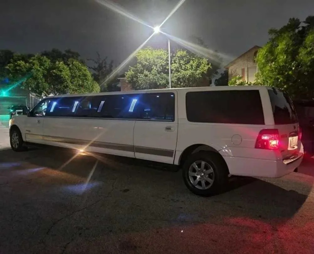 Ford Expedition Limousine White Ford Expedition Limousine with tinted windows for wedding car rental