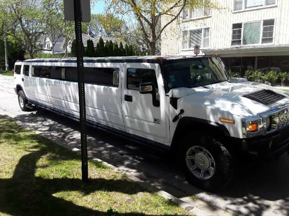 White Hummer H2 Limousine for wedding car rental