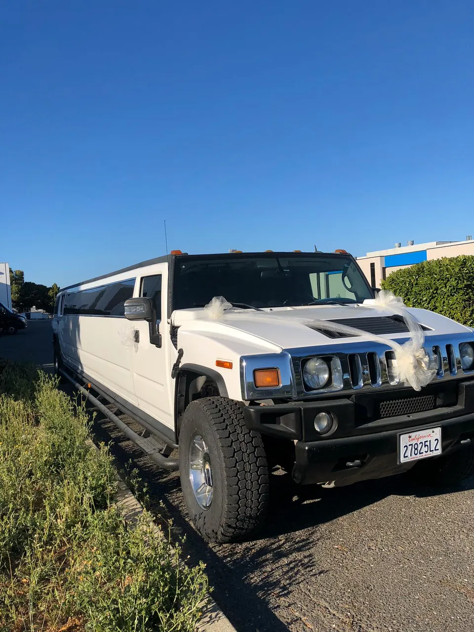 White Hummer Limousine, photo 4 for wedding car rental