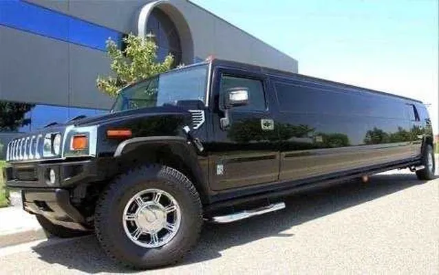 Hummer Limousine finished in black, bookable now