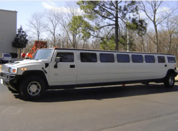 White Hummer Limousine Hummer Limousine finished in white; tinted windows visible