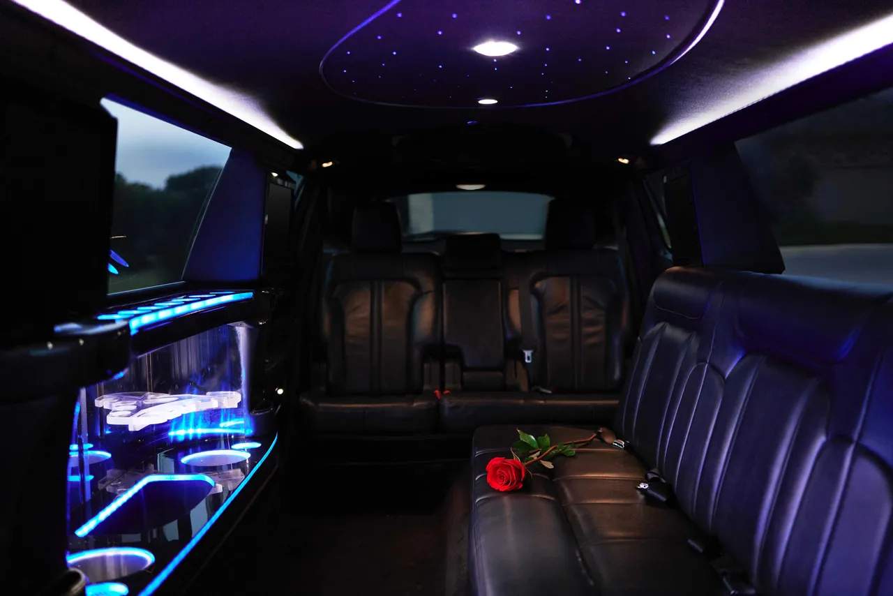 Lincoln MKT Limousine interior with LED accent lighting, starlight or fiber-optic ceiling and bar area for wedding car rental