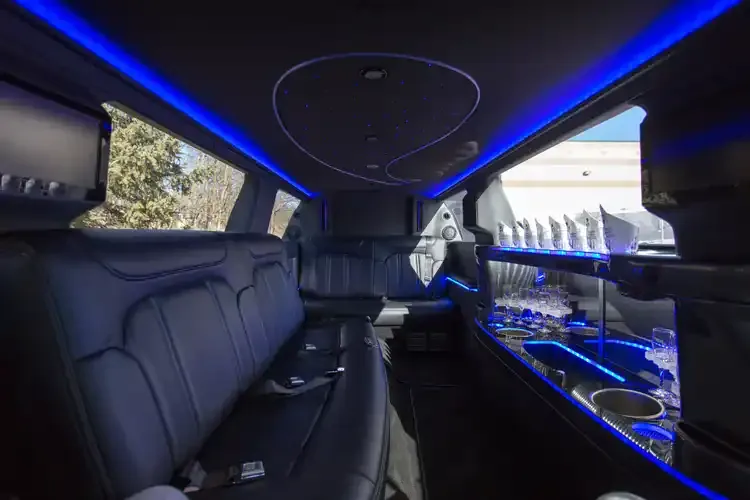 Lincoln MKT Limousine interior with LED accent lighting, starlight or fiber-optic ceiling and bar area for wedding car rental