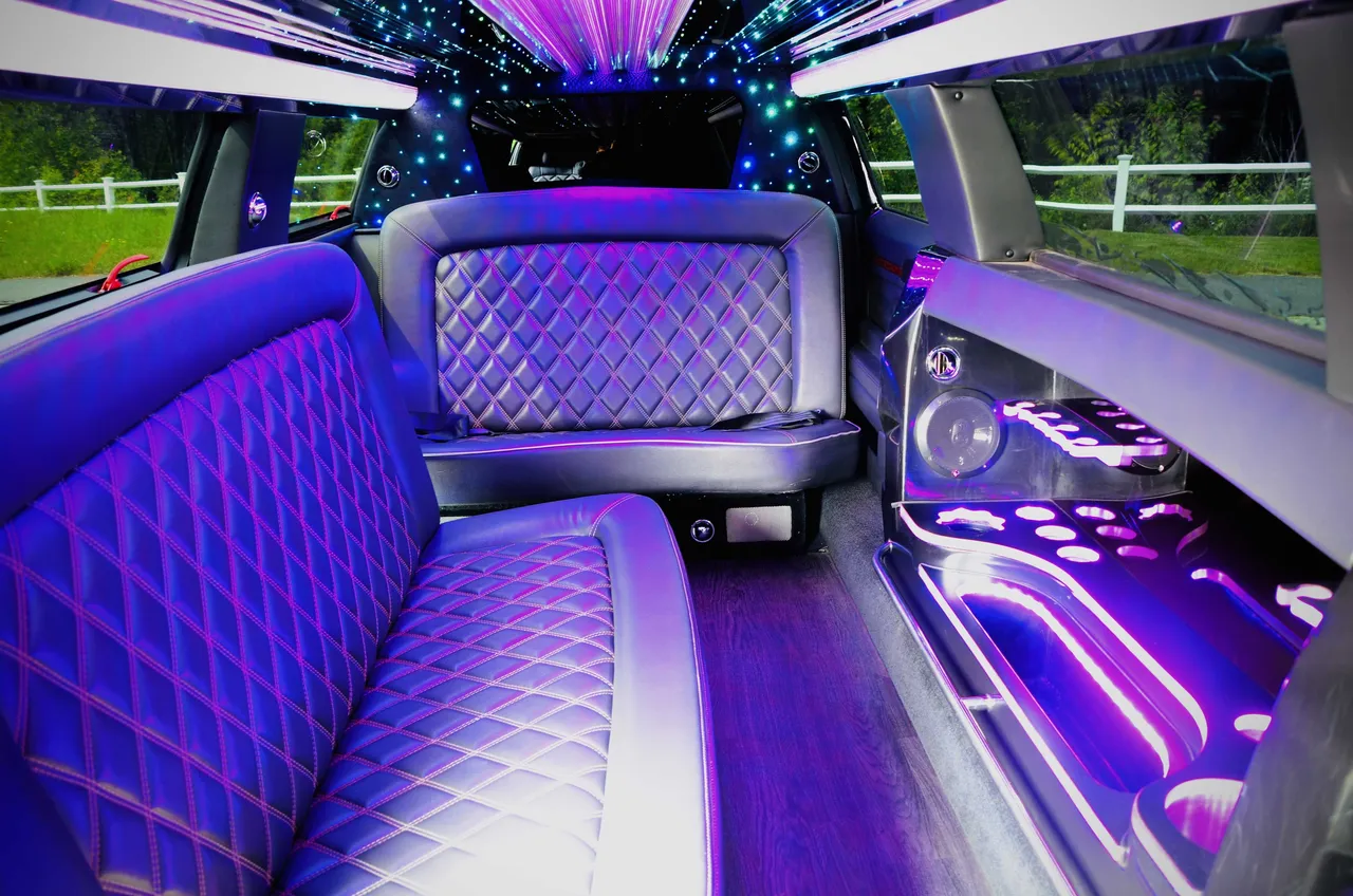 Lincoln MKT Limousine interior with LED accent lighting, LED ceiling lighting and starlight or fiber-optic ceiling for wedding car rental