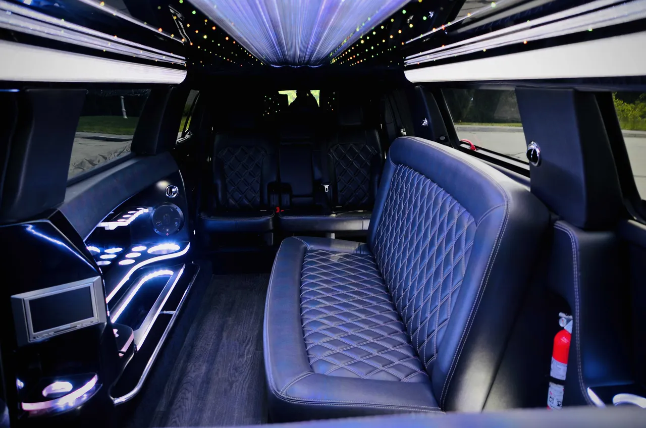 Lincoln MKT Limousine interior with LED accent lighting, LED ceiling lighting and starlight or fiber-optic ceiling, photo 3 for wedding car rental