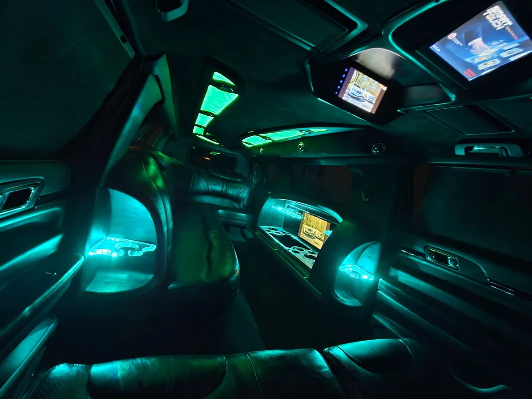 Lincoln MKT Limousine interior with LED accent lighting and TV screens, photo 4 for wedding car rental
