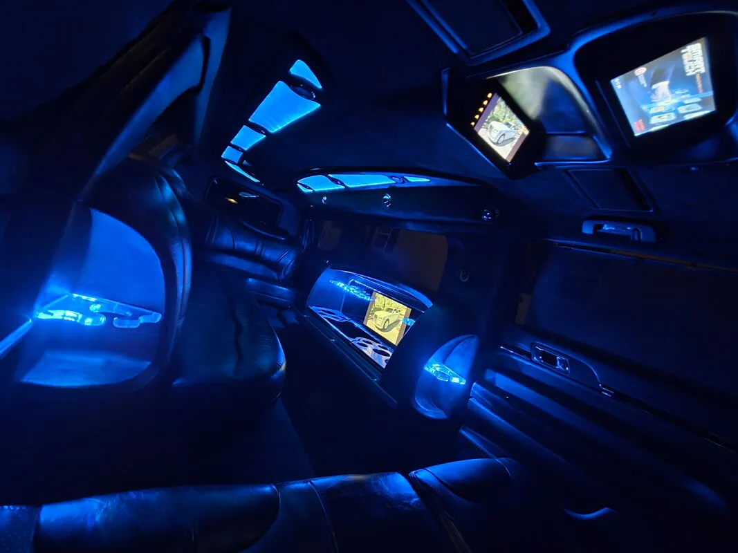 Lincoln MKT Limousine interior with LED accent lighting and TV screens, photo 5 for wedding car rental