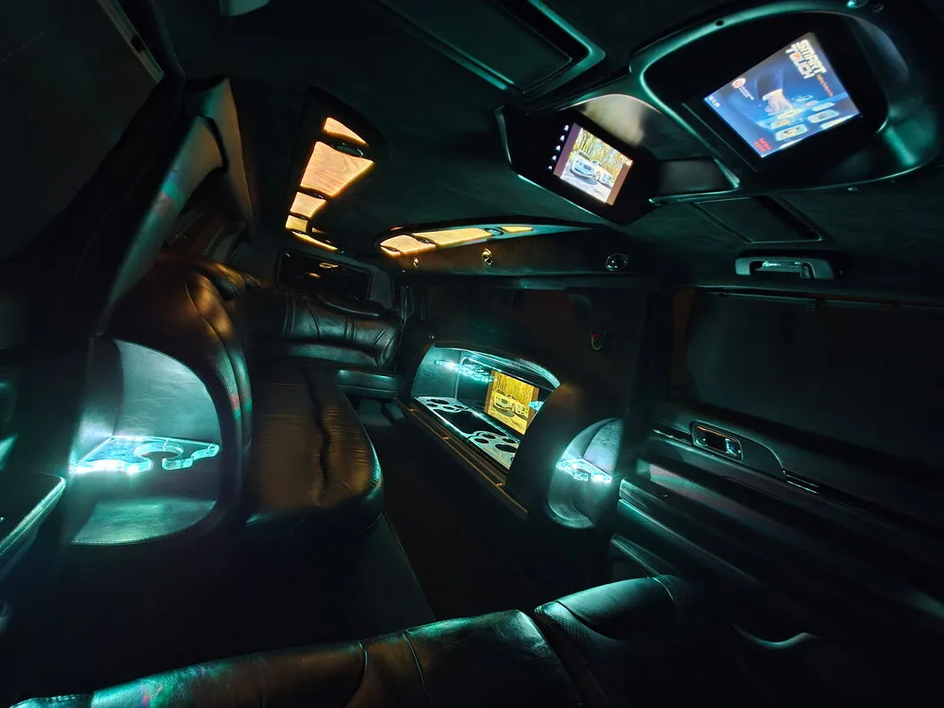 Lincoln MKT Limousine interior with LED accent lighting and TV screens, photo 6 for wedding car rental