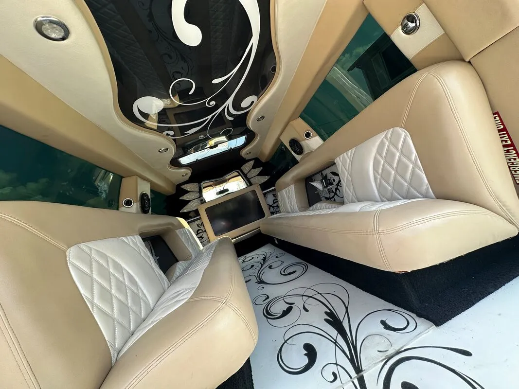 18 Passenger Lincoln Navigator interior with TV screens, photo 9 for wedding car rental