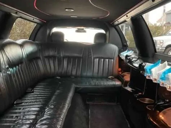 Lincoln Town Car finished in white, bookable now