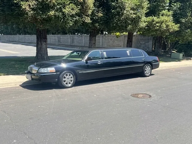 Lincoln Town Car Limousine finished in black, bookable now