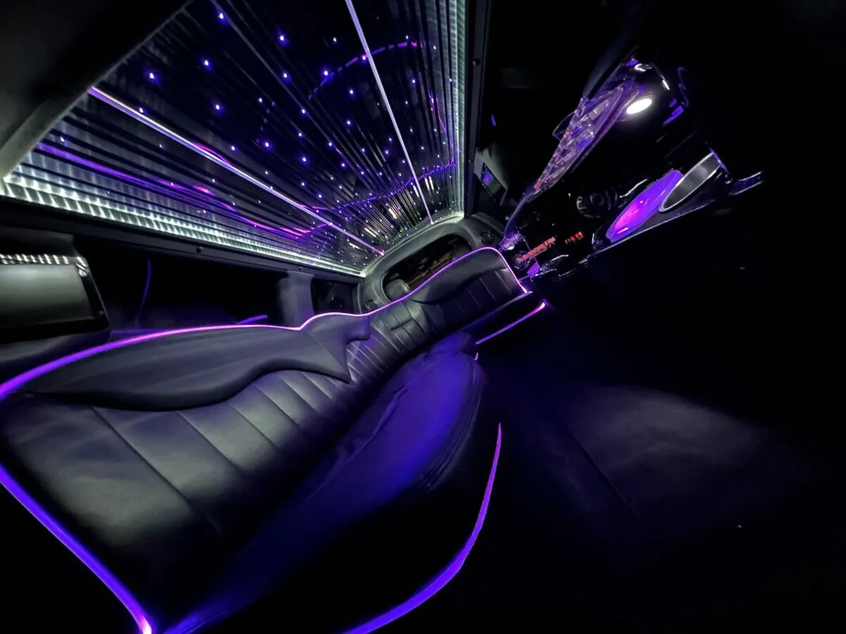 Lincoln Town Car Limousine interior with LED accent lighting, LED ceiling lighting and starlight or fiber-optic ceiling, photo 9 for wedding car rental in Windsor, CT