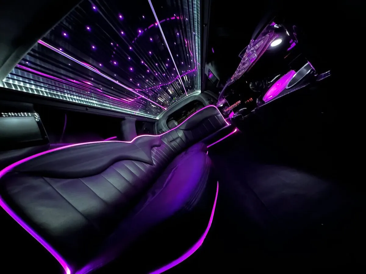 Lincoln Town Car Limousine interior with LED accent lighting, LED ceiling lighting and starlight or fiber-optic ceiling, photo 10 for wedding car rental in Windsor, CT