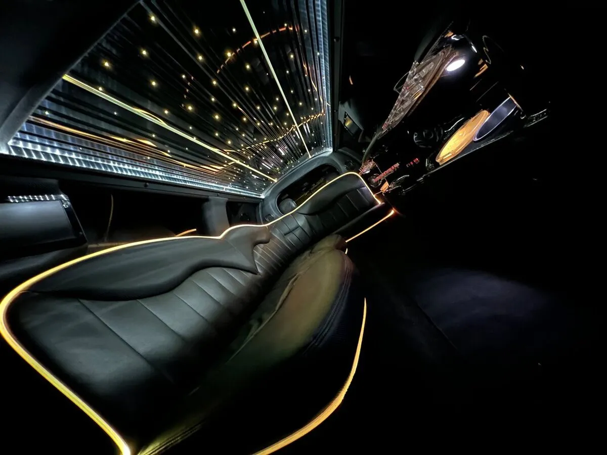 Lincoln Town Car Limousine interior with LED accent lighting, LED ceiling lighting and starlight or fiber-optic ceiling, photo 7 for wedding car rental in Windsor, CT