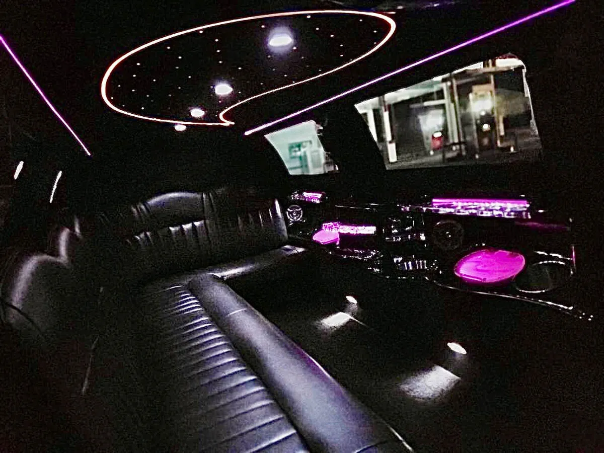 Lincoln Town Car Limousine interior with starlight or fiber-optic ceiling, photo 9 for wedding car rental in North Canton, CT