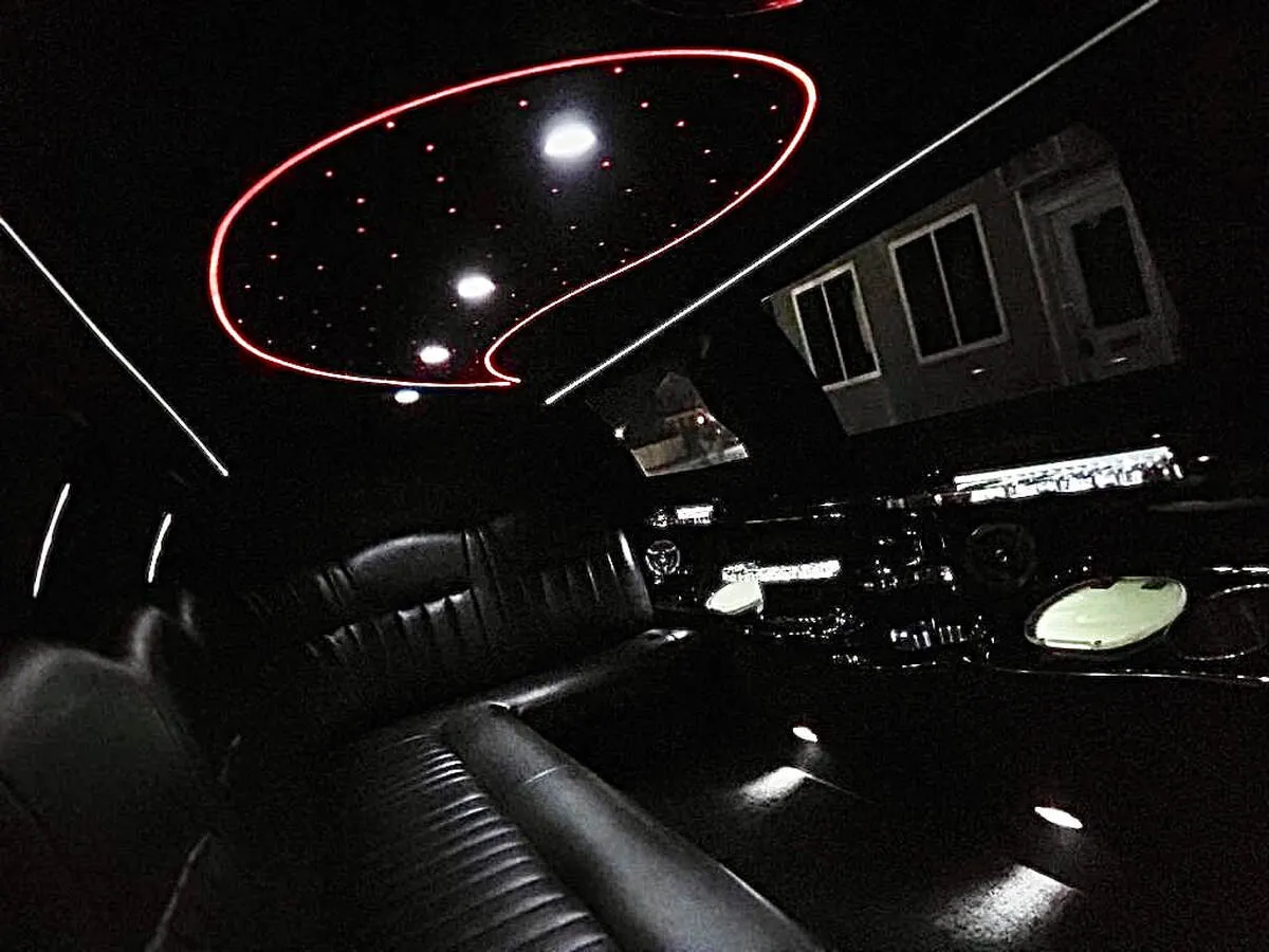 Lincoln Town Car Limousine interior with starlight or fiber-optic ceiling, photo 7 for wedding car rental in North Canton, CT