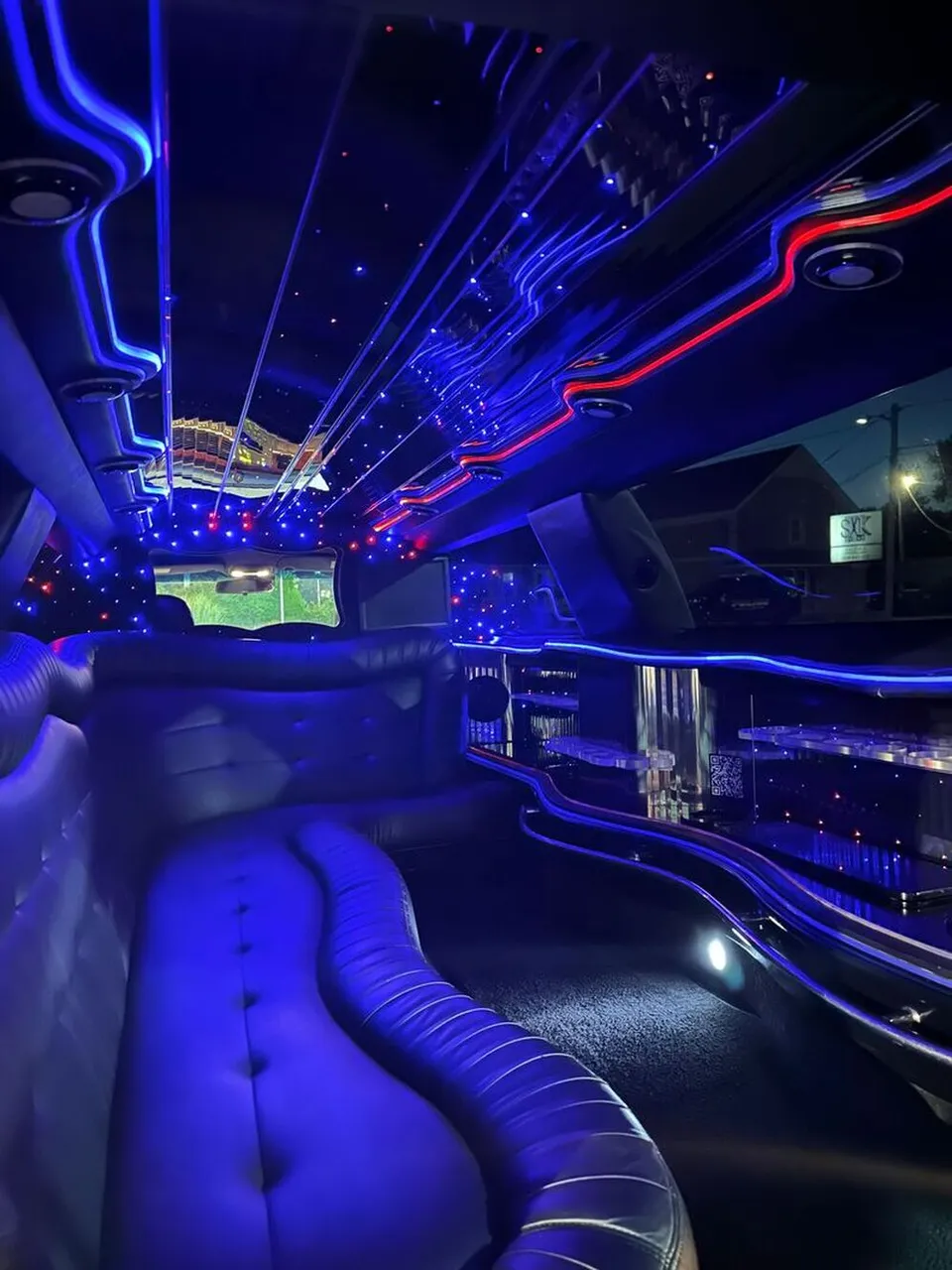 Lincoln Town Car Limousine interior with sofa-style seating, LED accent lighting and starlight or fiber-optic ceiling, photo 9 for wedding car rental in Windsor, CT