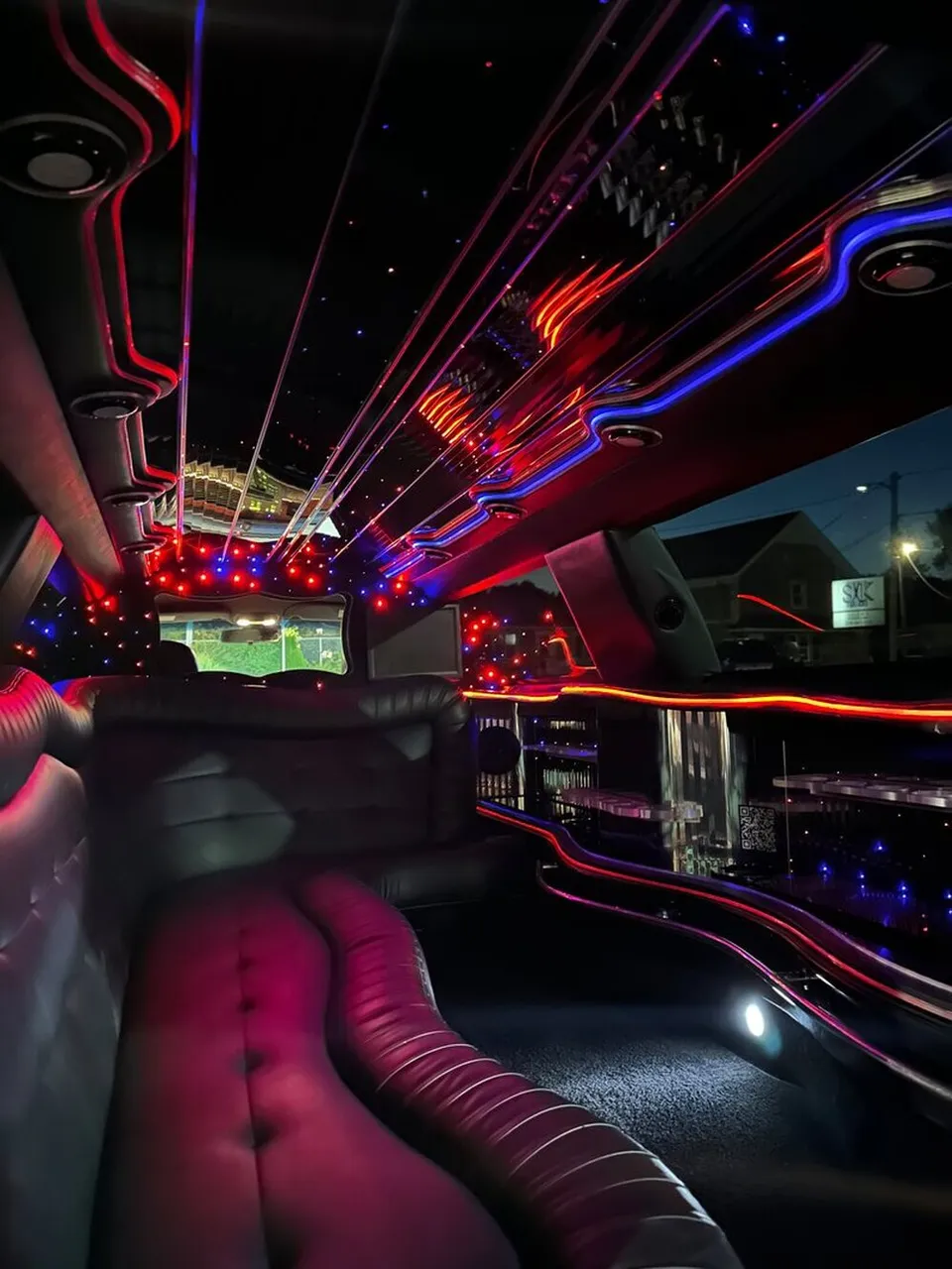 Lincoln Town Car Limousine interior with sofa-style seating, LED accent lighting and starlight or fiber-optic ceiling, photo 10 for wedding car rental in Windsor, CT