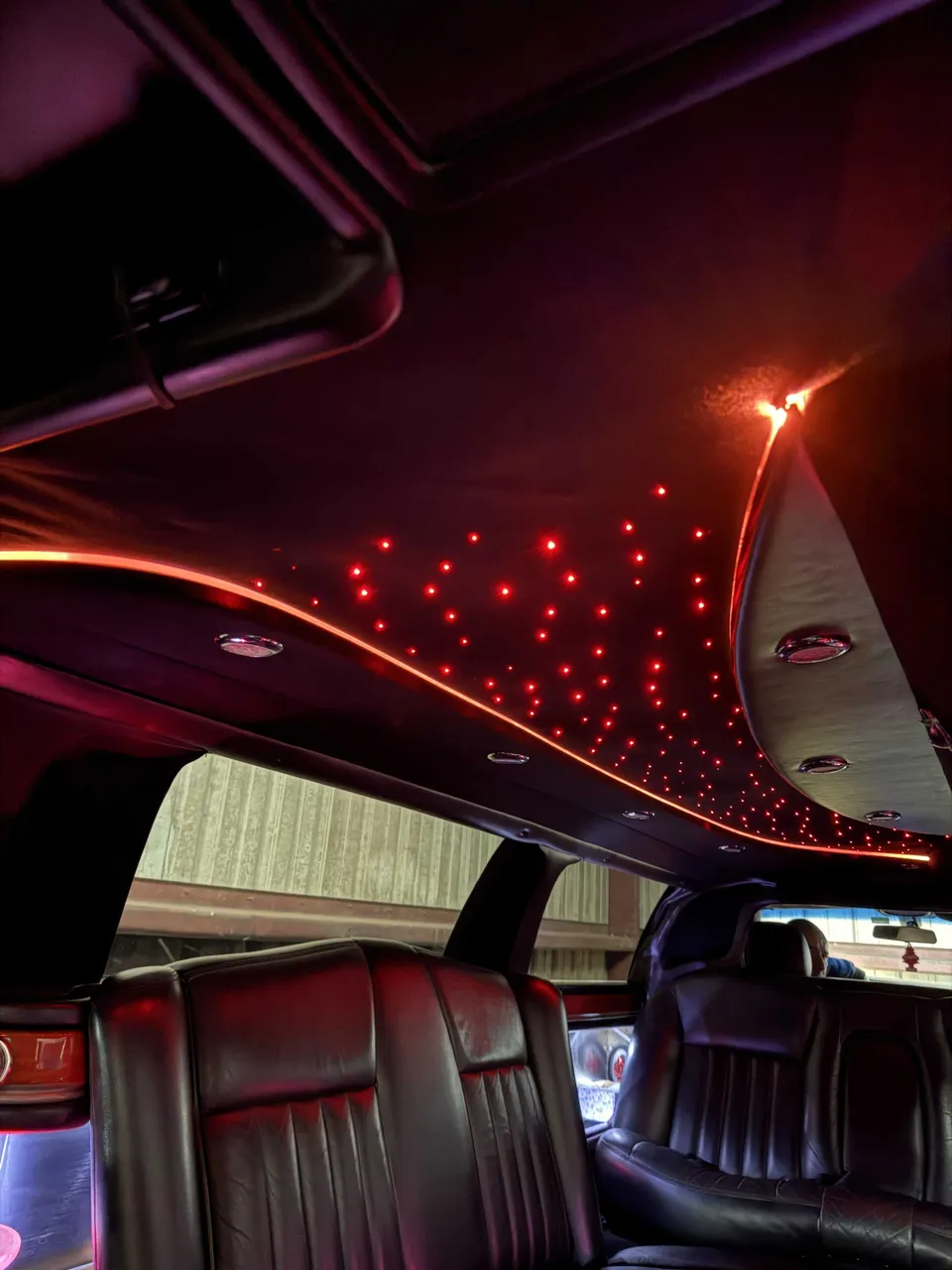 Lincoln Town Car Stretch Limousine interior with starlight or fiber-optic ceiling for wedding car rental