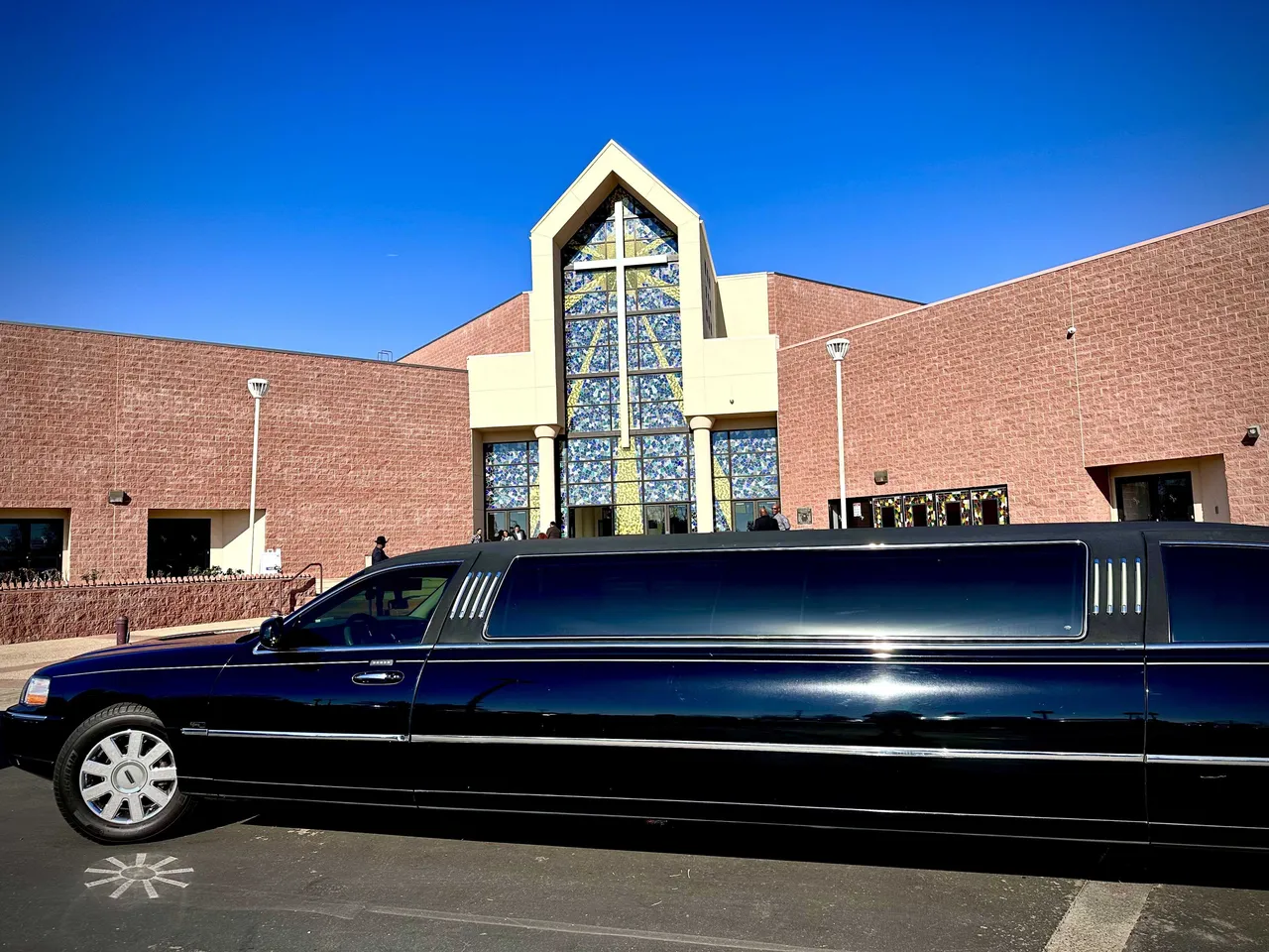 Black Lincoln Town Car Limousine exterior with tinted windows for wedding car rental
