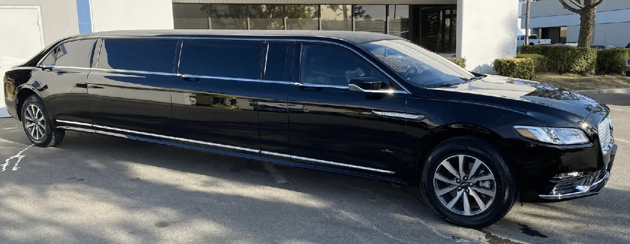 Lincoln Town Car Limousine Black Lincoln Town Car Limousine with tinted windows for wedding car rental